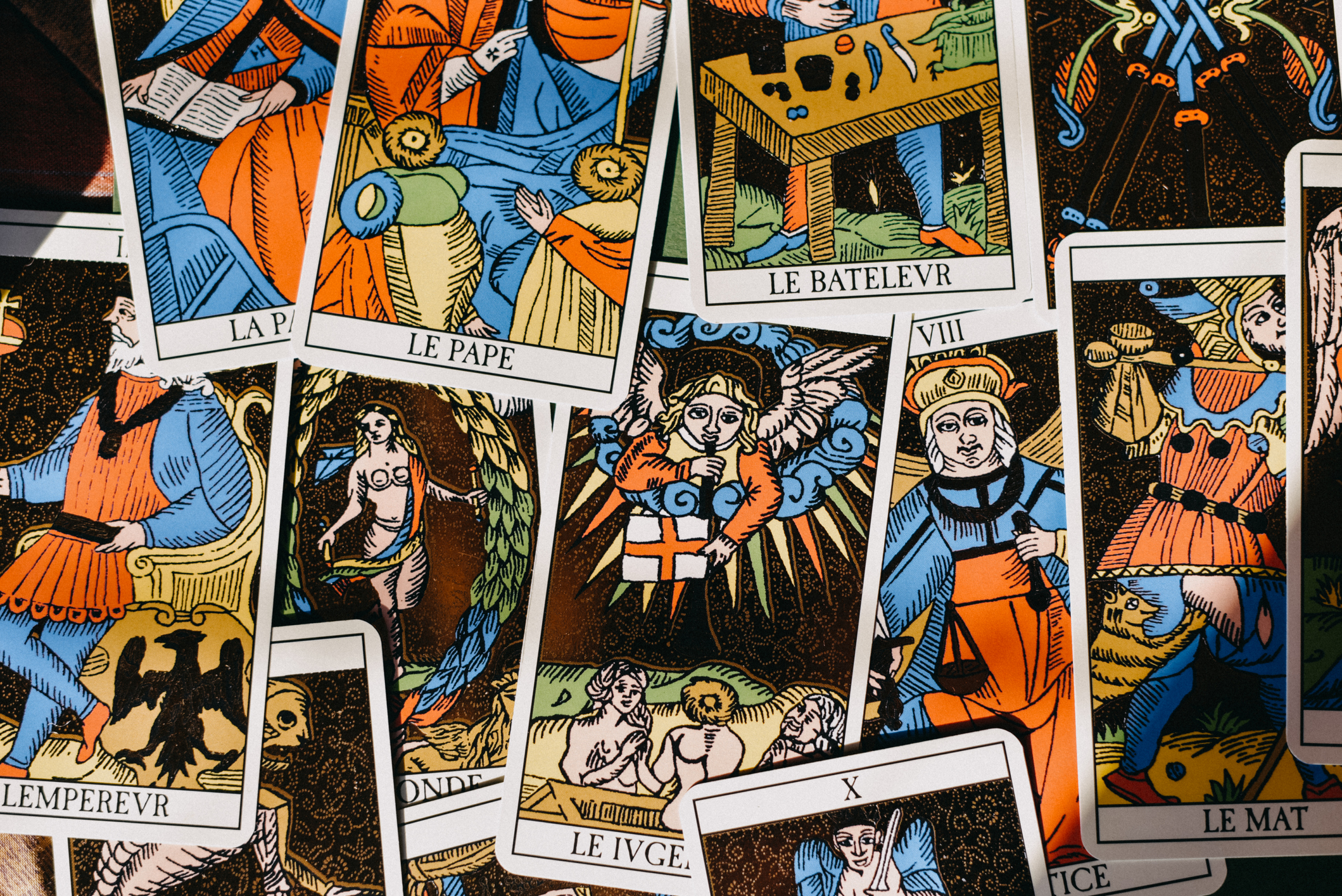 Why is tarot card art so captivating to people? Discover the real magic behind the powerful images.